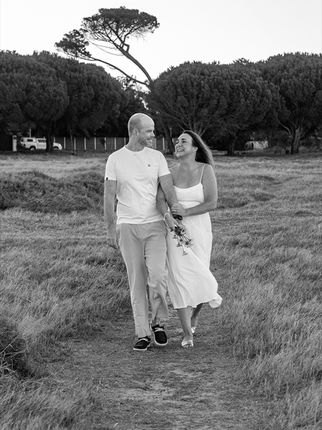Angel and Andrew walking and laughing together